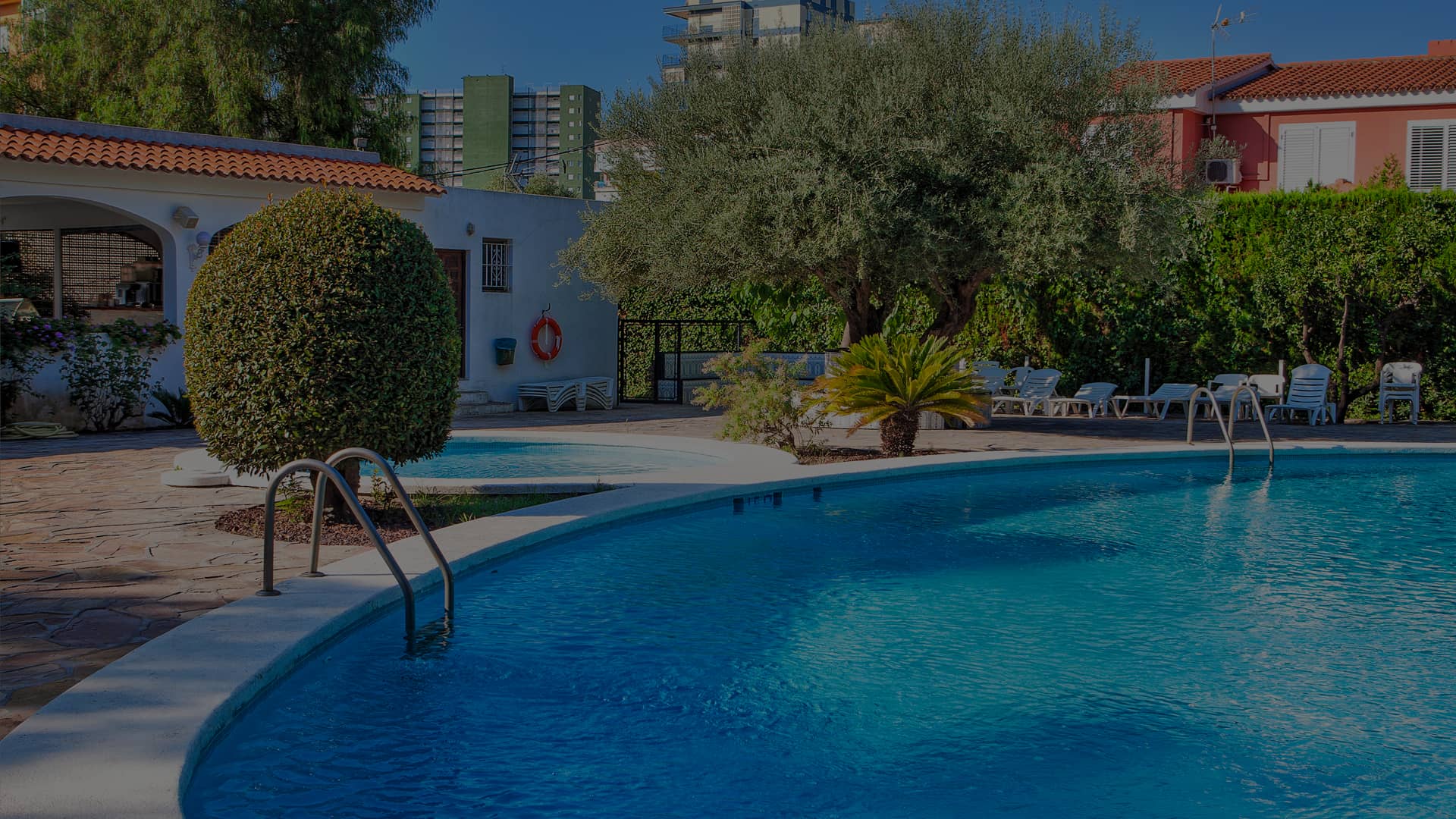 Pool Area Pool area at the Hotel Vista Alegre, surrounded by plastic sun loungers.